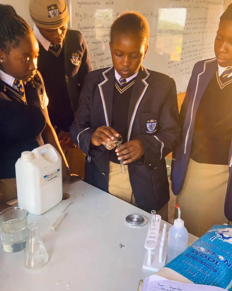 Learners taking part in a practical science activity